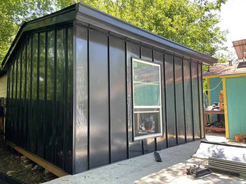 Black standing seam metal wall panels for Roof Inspection in Montecito