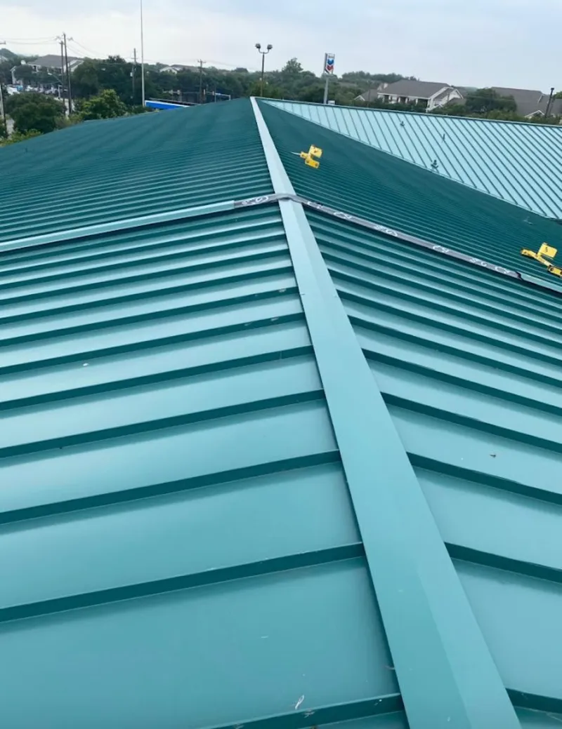Green commercial metal roof ridge and valley for Metal Roof Repair in Montecito