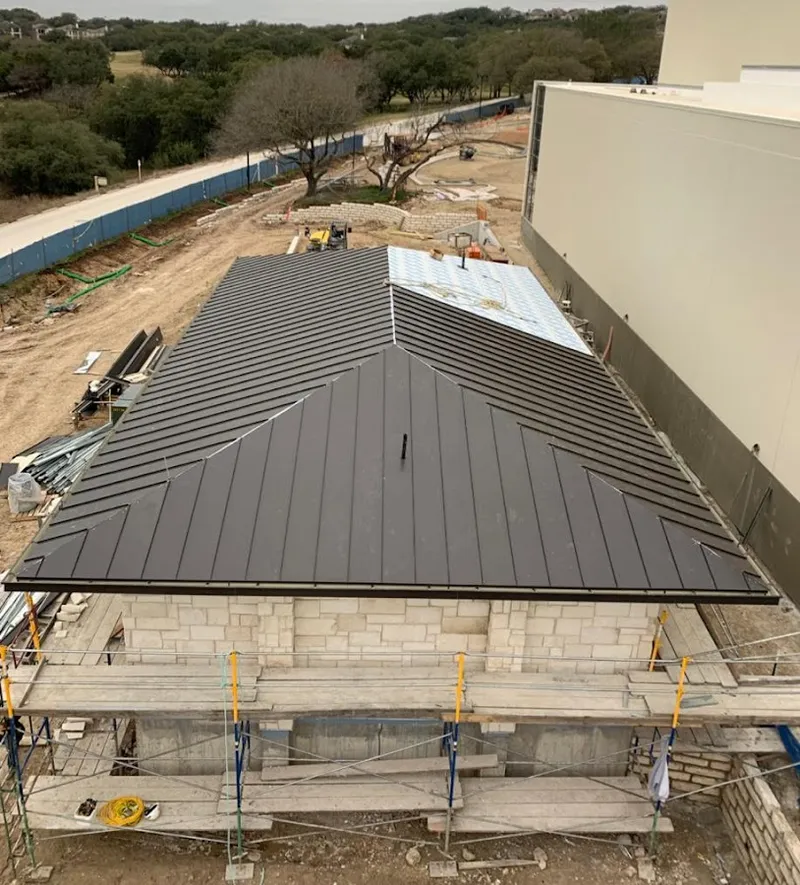 Metal roof new construction with scaffolding in Montecito